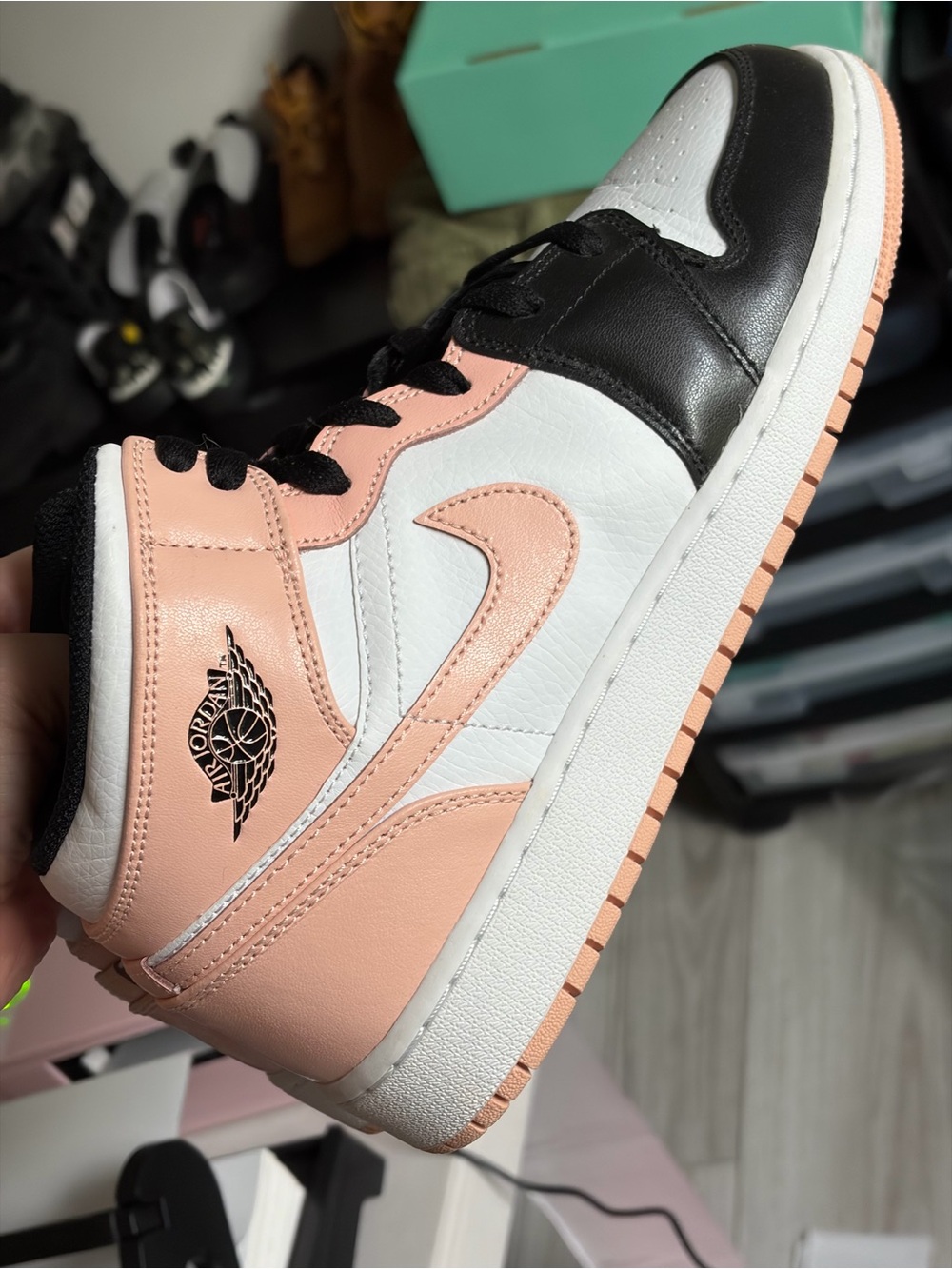 Jordan Women’s Mid-Top Sneakers in Peach/Black/White